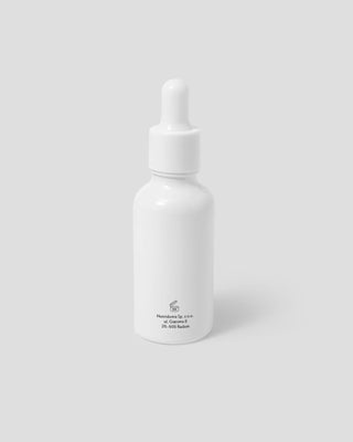 Koenzim Q10 i vitamin E Nutridome pomlađujući serum za lice